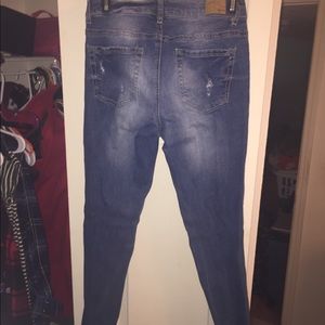 Medium Dark washed distressed jeans